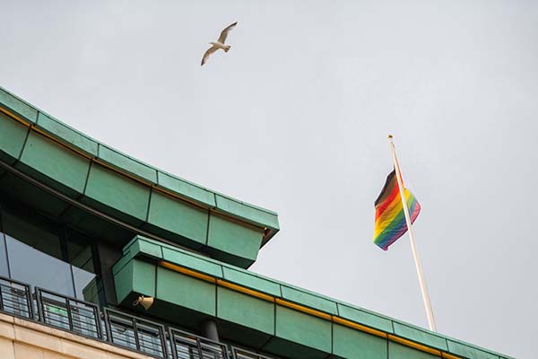 The rainbow flag flying over Globe House